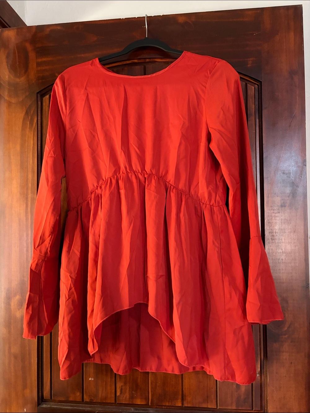 Women's Rust Peplum Long-Sleeve Top